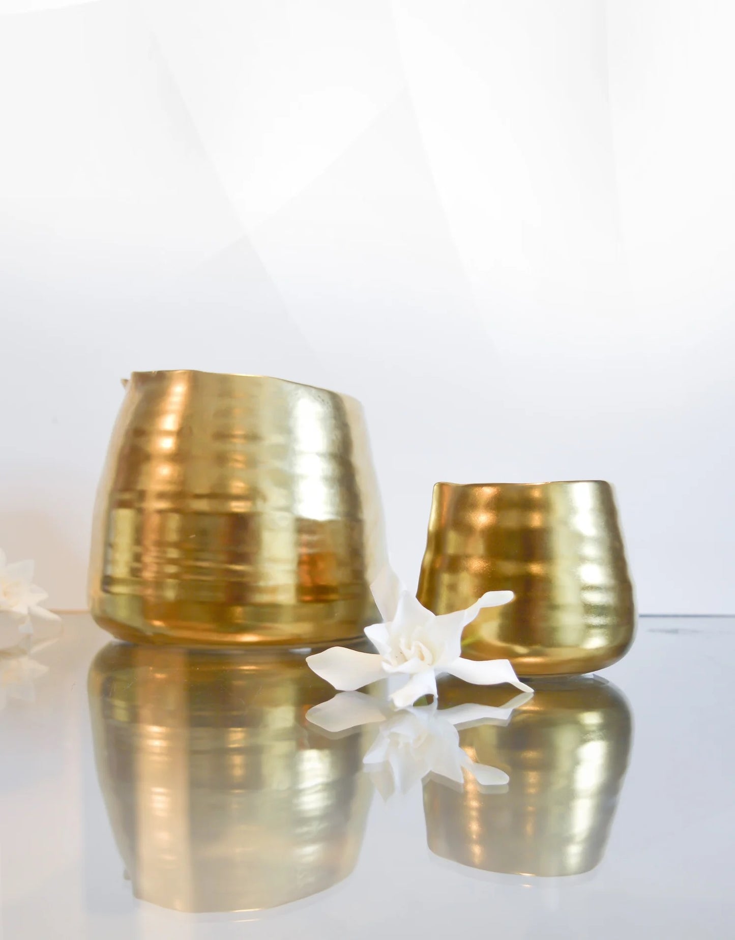 large and small gold candle