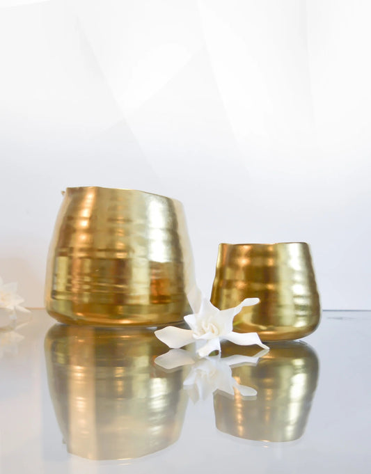 large and small gold candle